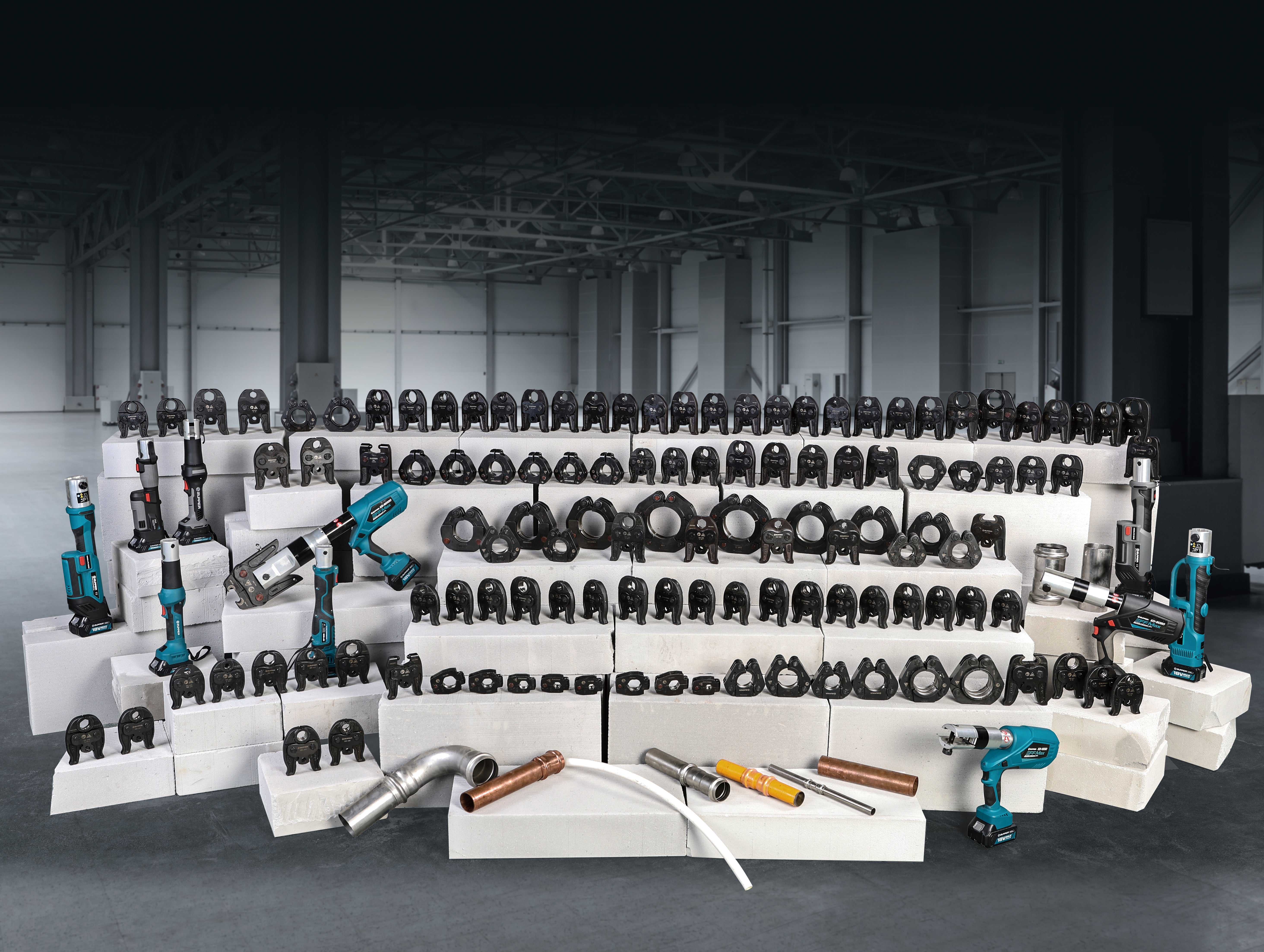 ZUPPER professional press tools, jaws, rings, and accessories displayed in the showroom
