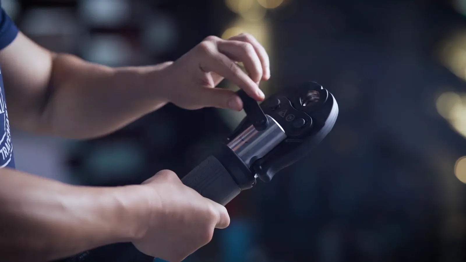 Hands fitting a press jaw onto a ZUPPER PZ-2430 cordless press tool